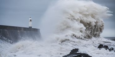 Waves crashing against the UK coast