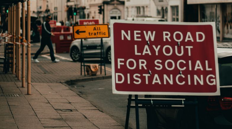 Social distancing road sign